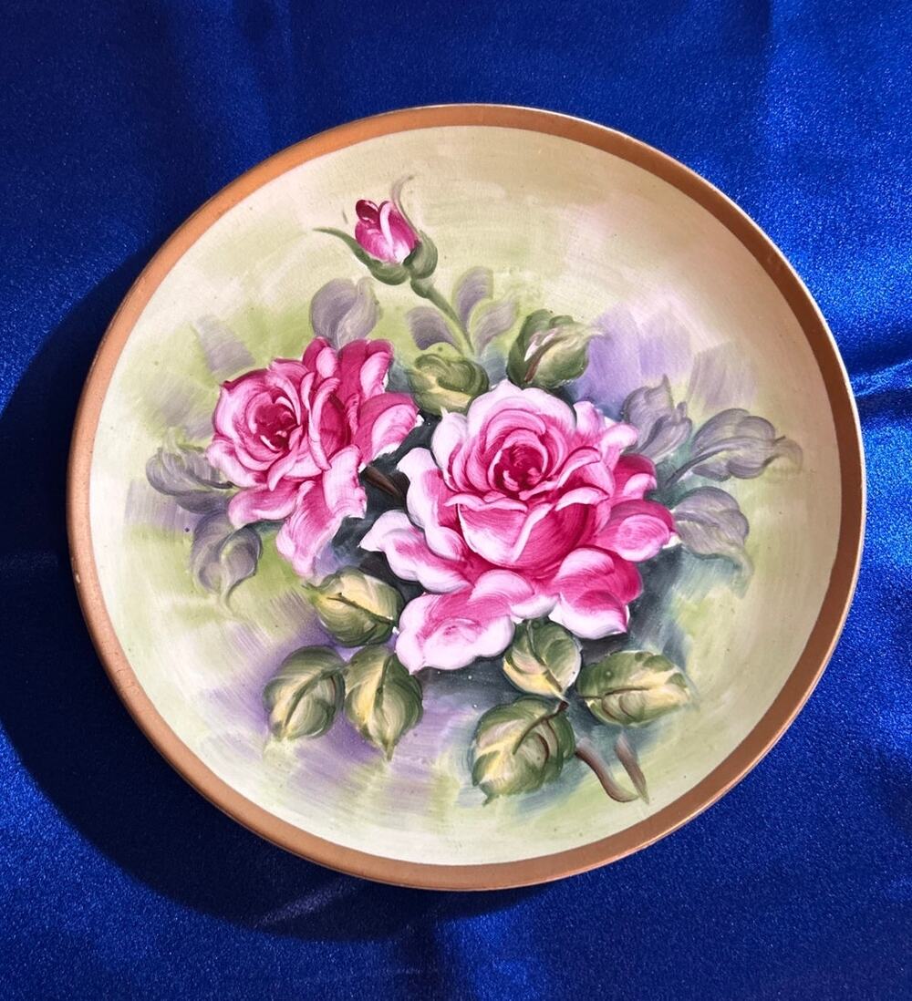 Unmarked hand painted plate